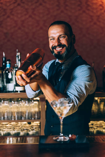 istock Barman is making cocktail at night club. 680866364