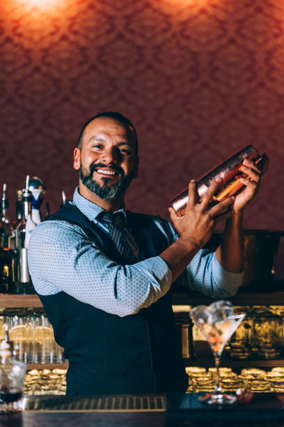 istock Barman is making cocktail at night club. 680866452