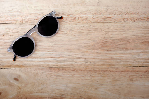 istock Glasses on wooden background 680866678