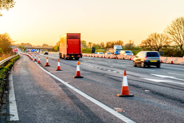 istock Evening view UK Motorway Services Roadworks Cones 680873632