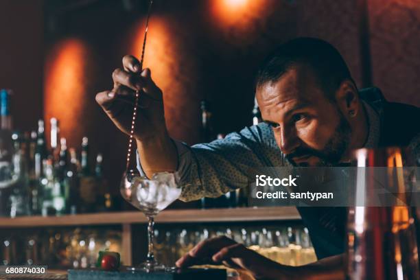 Barman Is Making Cocktail At Night Club Stock Photo - Download Image Now - Bartender, Bar Counter, Adult