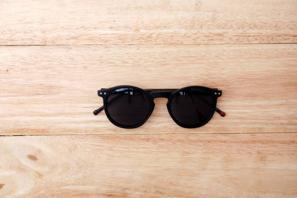istock Glasses on wooden background 680874402