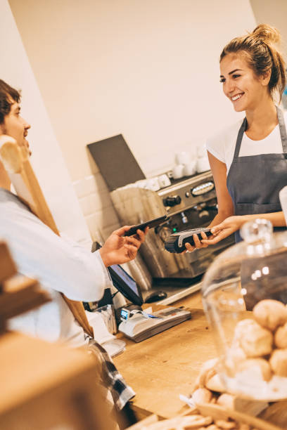istock Smart phone payment in the coffee shop 680881756