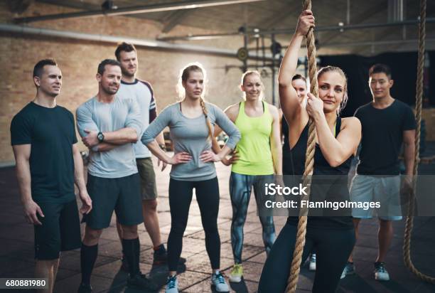 Woman Holding Climbing Rope In Gym Exercises Stock Photo - Download Image Now - Active Lifestyle, Activity, Adult