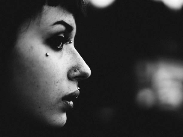 istock tattooed girl portrait 680882288