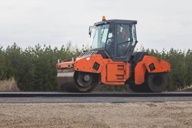 istock Red asphalt compactor - road rollers at asphalt pavement works - construction of the highway 680888234