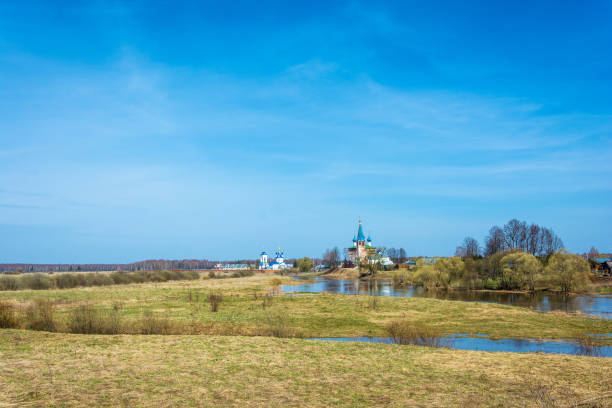 Landscape with the assumption Dunilovskiy women's monastery, Ivanovo oblast, Russia. Beautiful landscape with the assumption Dunilovskiy a convent in spring Sunny day, Ivanovo oblast, Russia. ivanovo oblast photos stock pictures, royalty-free photos & images