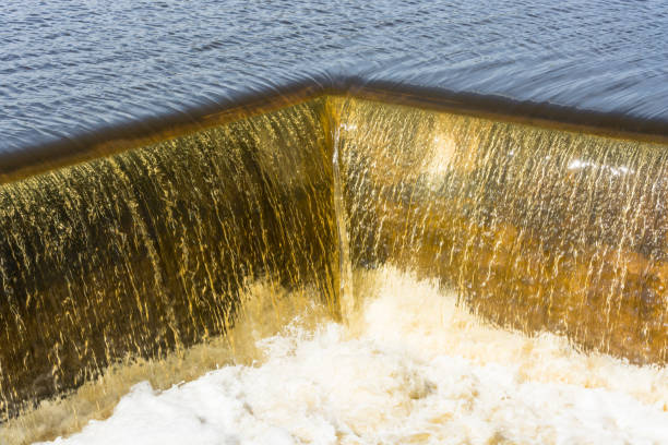 istock Wall of falling water and the white swirling foam. 680890522