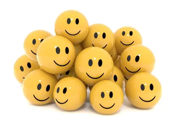 Photo of yellow smileys in social media concept on isolated white 3D rendering