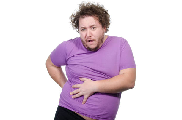 istock Diarrhea. Funny overweight guy. White background. 680913316