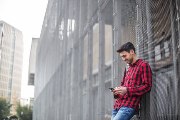 istock Charming hipster man outdoors 680913338