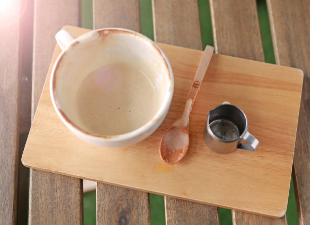 istock Empty cup of coffee on wooden table. 680916322