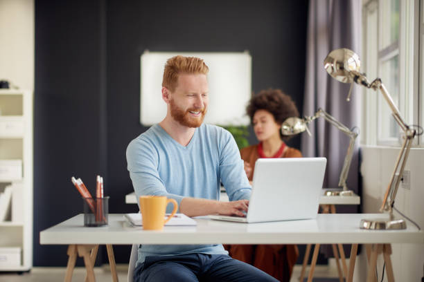 istock multi-ethnic businesspeople in modern office 680955952