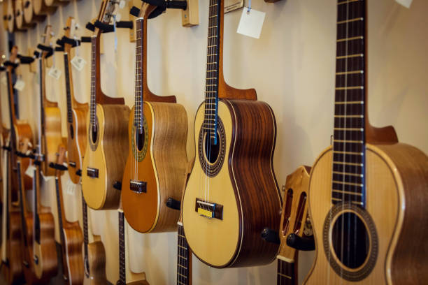 istock Rows of acoustic guitars on the wall 680956814