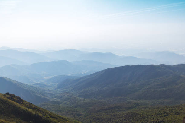 istock sunset of the mountains with mountain ranges 680957082