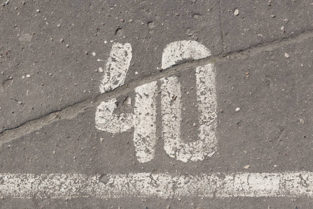 istock Number 40, forty, painted on asphalt 680960426
