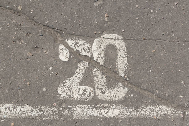 istock Number 20, twenty, painted on asphalt 680960554