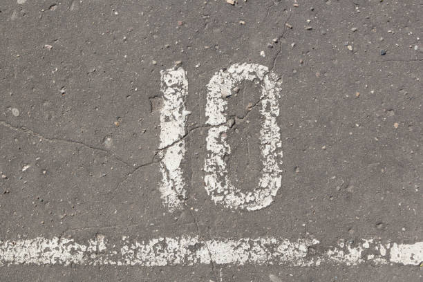 istock Number 10, ten, painted on asphalt 680960566