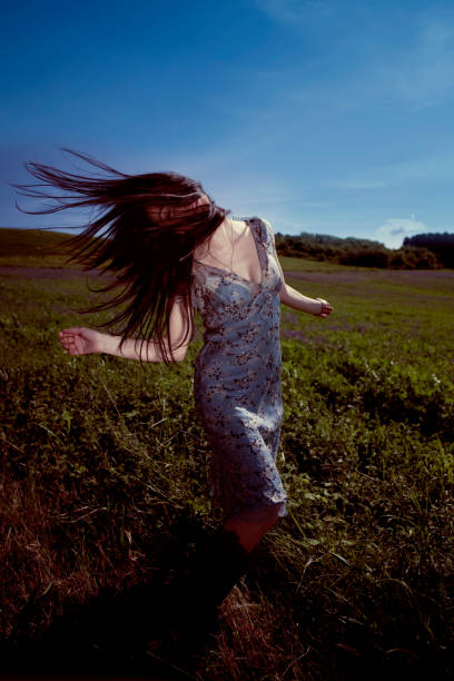 istock countryside portrait with young woman 680983616