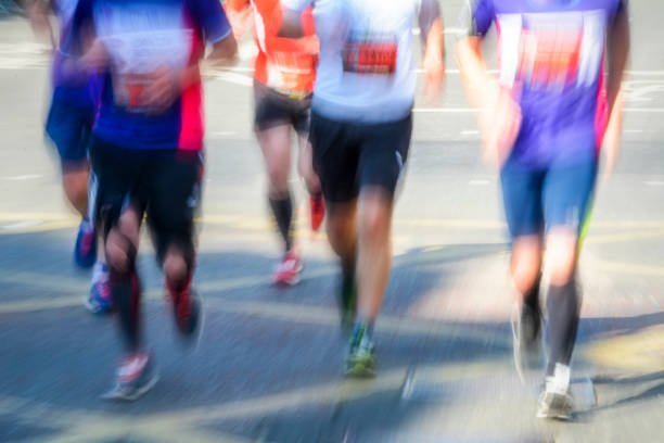 istock Blurred motion of group of marathon runners 680984372