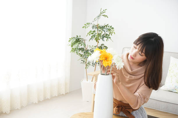 istock Young woman having flowers 680984752