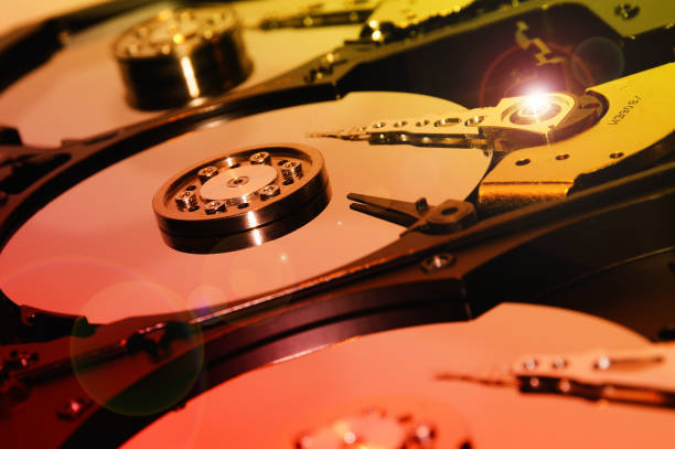 istock close up of hard disk with postproductions effects 680999764