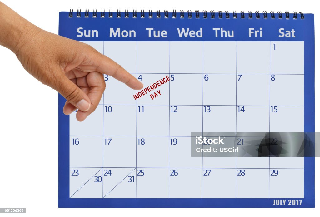 July 2017 Calendar Hand pointing to Independence Day Hand pointing to Independence Day July 2017 Calendar isolated on white background 2017 Stock Photo