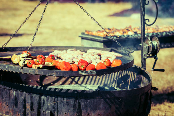 Assorted delicious grilled meat with vegetable over the coals on a barbecue