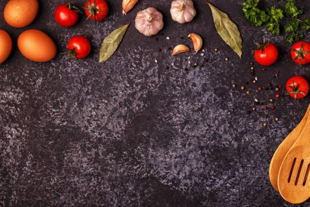 istock Ingredients for cooking on dark concrete background. 681018922