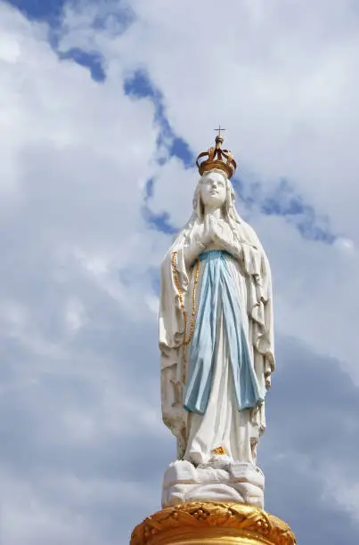 Photo of Our Lady, Virgin Mary, Mother of God in cloud sky