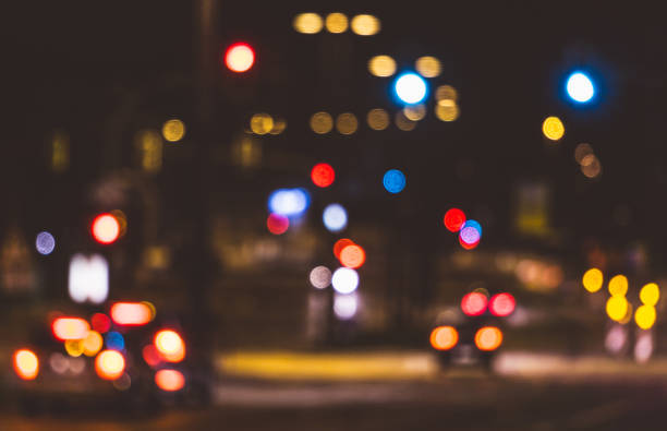 istock Bokeh effect from street lights and car at night. 681057586