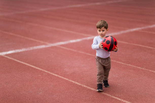 istock Ready to play with my red ball 681070478