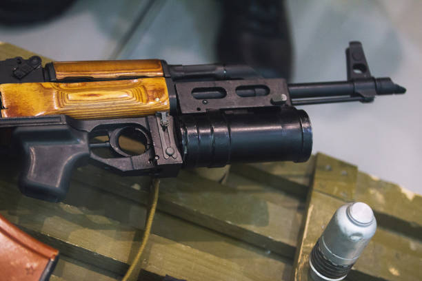 istock rifle with underbarrel grenade launcher, close up 681078502