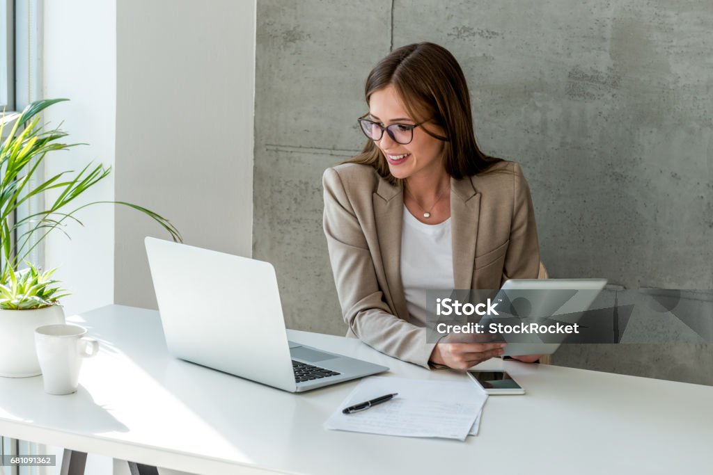 Searching for new solution Working on a computer Businesswoman Stock Photo