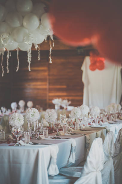 istock Wedding Birthday Reception Decoration, Chairs, Tables and Flowers 681119472