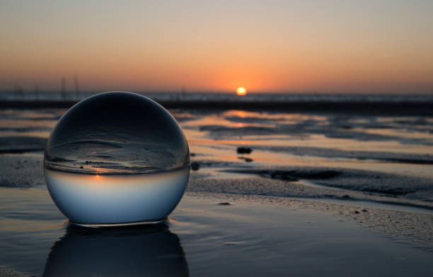 istock sunset in glass shpere 681148424