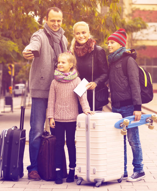 istock Parents with kids taking selfie 681155786