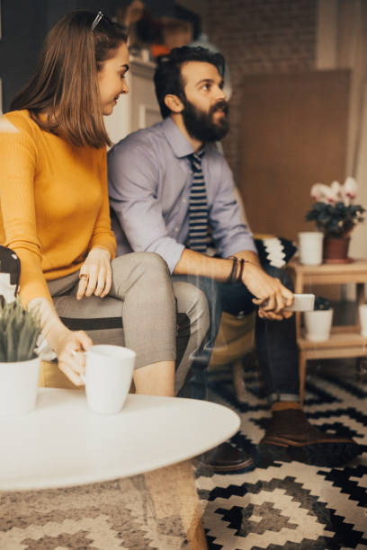 istock Couple is sitting in living room before going to work 681170694