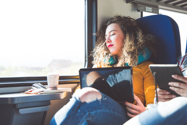 istock Conceived Curly-haired Girl  Day Dreaming In Train 681176484