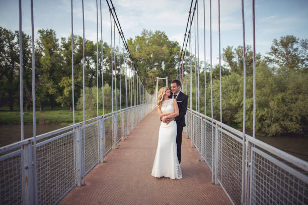 istock Wedding couple on the bridge 681177952