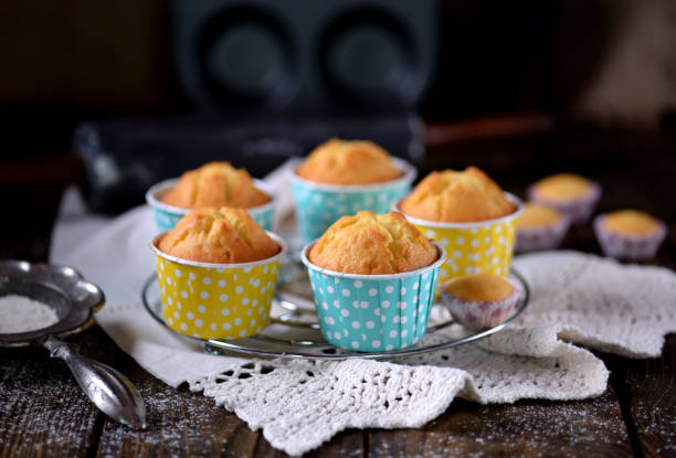 istock Classic muffins with raisins on a wooden background. 681181942