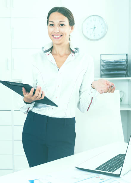 istock business woman with clipboard 681184466