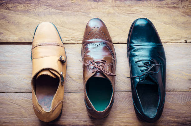 istock Leather shoes lay on the wooden floor concept for work 681186112