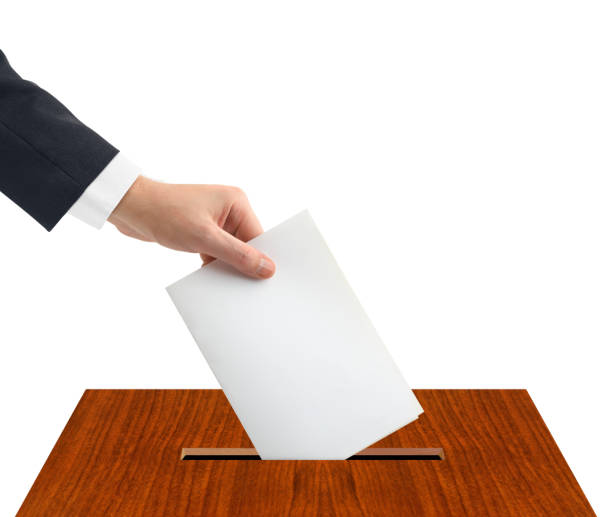 istock Hand with ballot and box 681198386