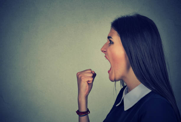 istock Portrait angry young woman screaming 681204214