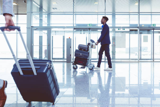 istock Young african guy at modern airport terminal 681213494