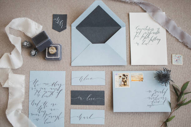 Wedding decor and calligraphy Beautiful vintage handwritten wedding calligraphy and decor details flatlay rsvp stock pictures, royalty-free photos & images