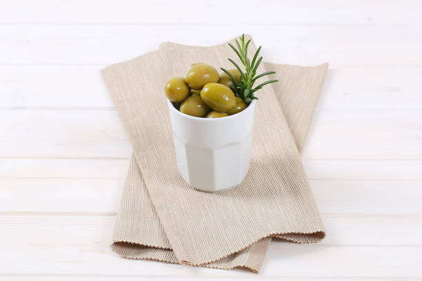 istock green olives with rosemary 681222544