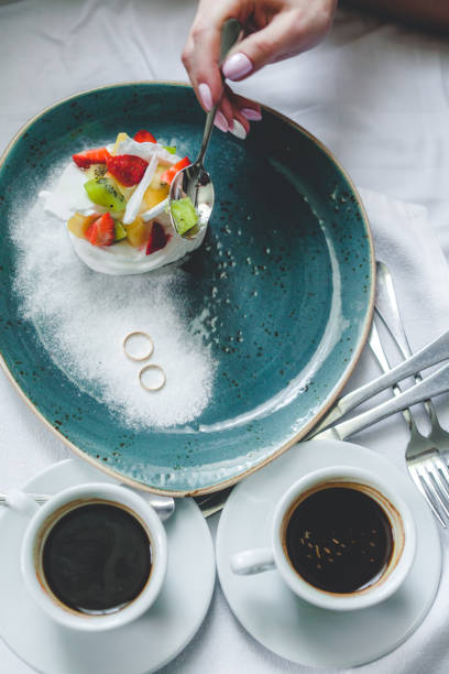 istock Dessert and coffee with wedding rings 681228920
