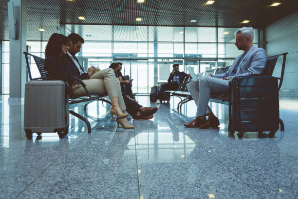 istock Passengers sitting in airport lounge area 681231870